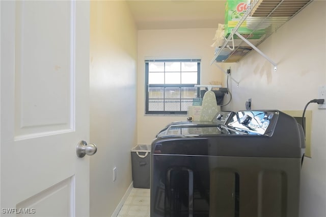 washroom featuring independent washer and dryer