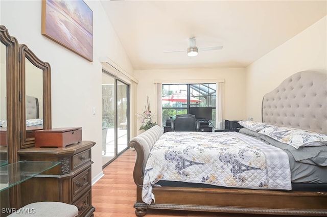 bedroom with light wood-type flooring, access to outside, vaulted ceiling, and ceiling fan