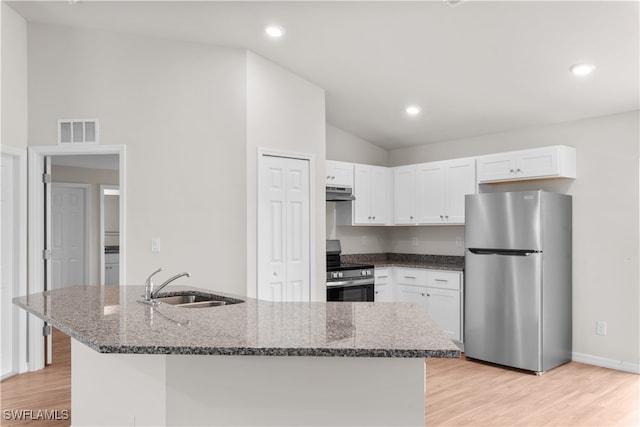 kitchen featuring sink, appliances with stainless steel finishes, and white cabinetry