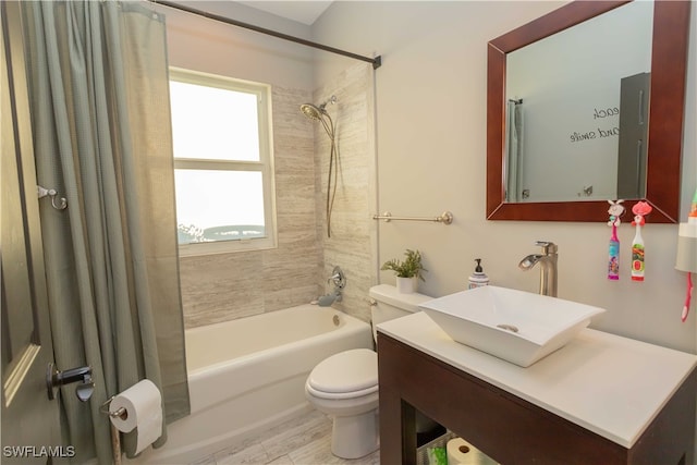 full bathroom featuring toilet, vanity, tiled shower / bath combo, and hardwood / wood-style flooring