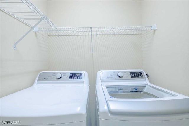 20730 Groveline Ct, Estero, FL 33928 - washroom featuring independent washer and dryer