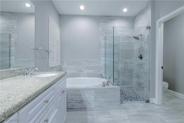 20730 Groveline Ct, Estero, FL 33928 - full bath with a bath, vanity, a stall shower, and recessed lighting