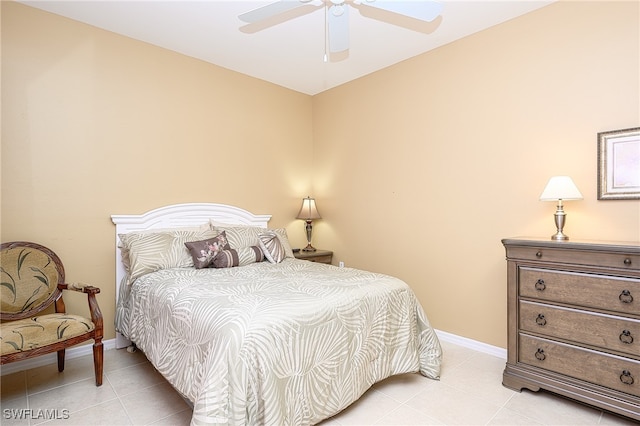 bedroom featuring ceiling fan and light tile patterned flooring