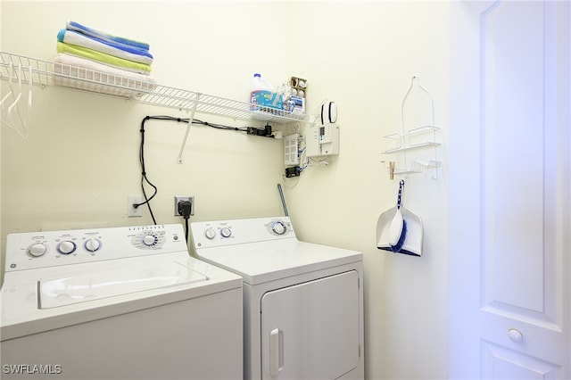 laundry area featuring separate washer and dryer