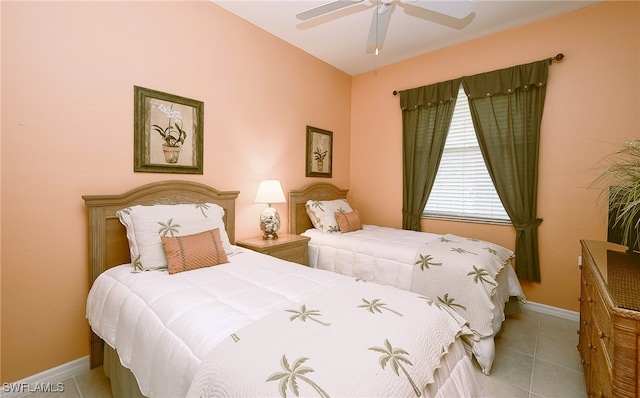 tiled bedroom featuring ceiling fan