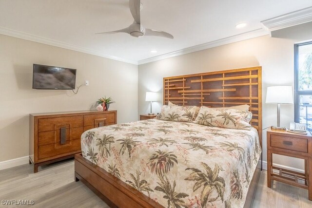 bedroom featuring ceiling fan, crown molding, and light hardwood / wood-style floors