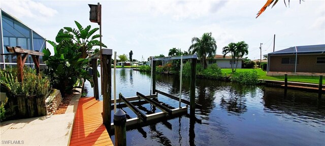 dock area with a water view