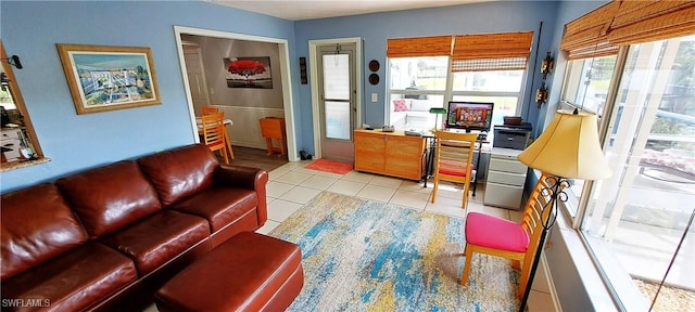 living area with light tile patterned flooring