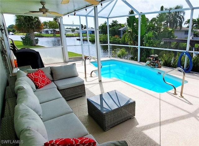 pool with ceiling fan, a water view, glass enclosure, an outdoor hangout area, and a patio