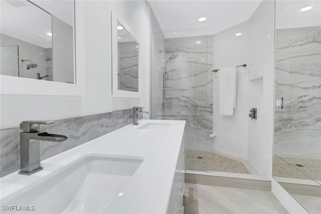 bathroom with vanity and an enclosed shower