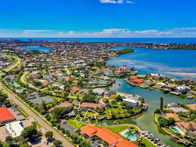 birds eye view of property featuring a water view