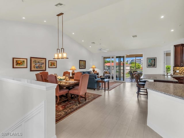 1105 Gayer Way Unit A-202, Marco Island, FL 34145 - dining room featuring a ceiling fan, high vaulted ceiling, and recessed lighting