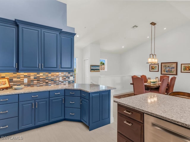 kitchen featuring hanging light fixtures, backsplash, blue cabinetry, and light stone counters