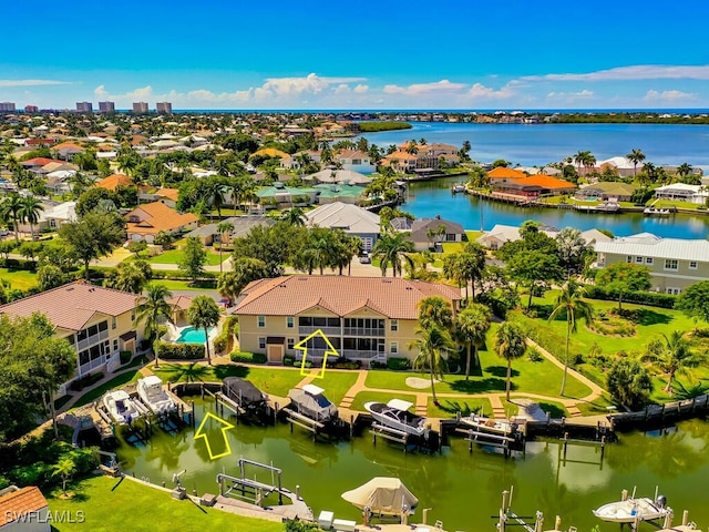 bird's eye view with a water view