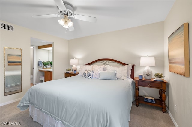 bedroom featuring light carpet and ceiling fan