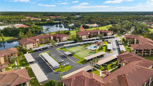 birds eye view of property featuring a water view