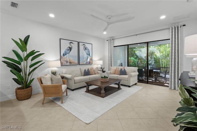 tiled living room with ceiling fan