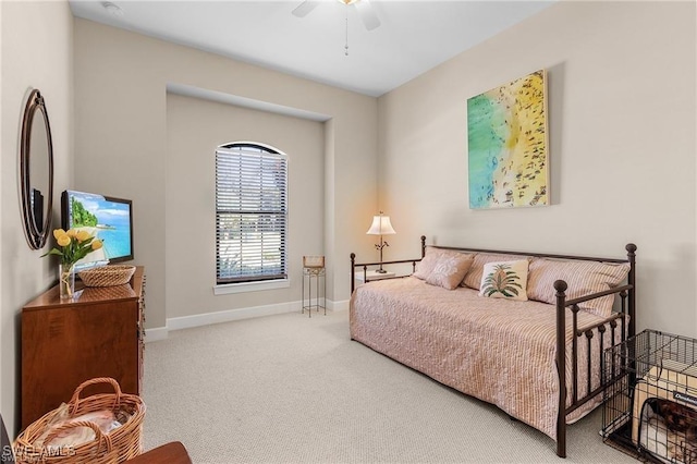 bedroom featuring baseboards, carpet, and ceiling fan