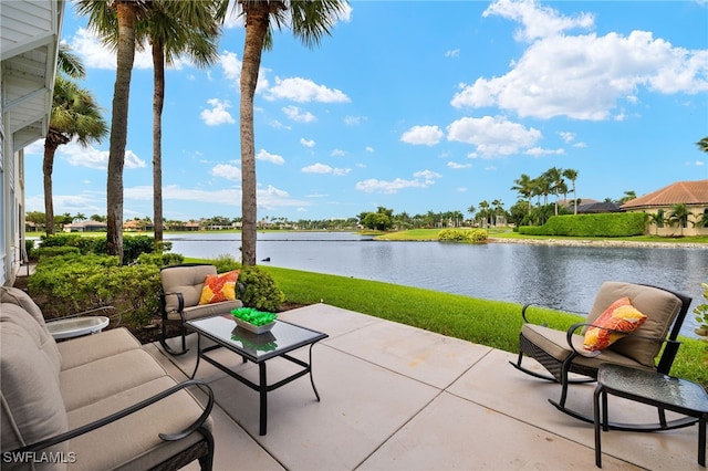 view of patio with a water view and an outdoor hangout area