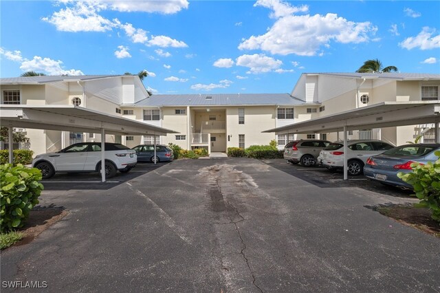 14987 Rivers Edge Ct Unit 139, Fort Myers, FL 33908 - covered parking lot with a residential view