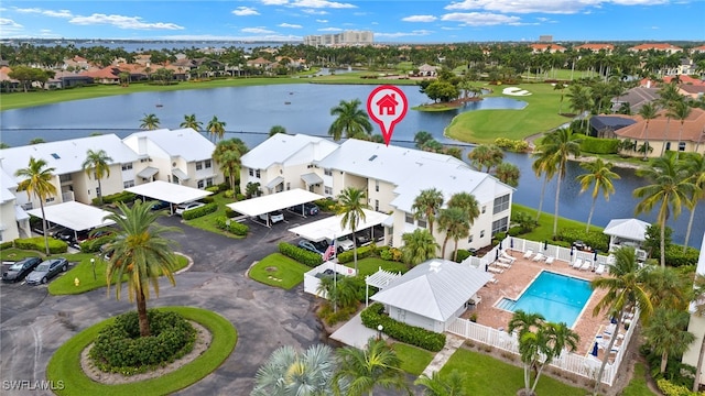 14987 Rivers Edge Ct Unit 139, Fort Myers, FL 33908 - aerial view of residential area featuring a large body of water, a pool area, and a local golf course