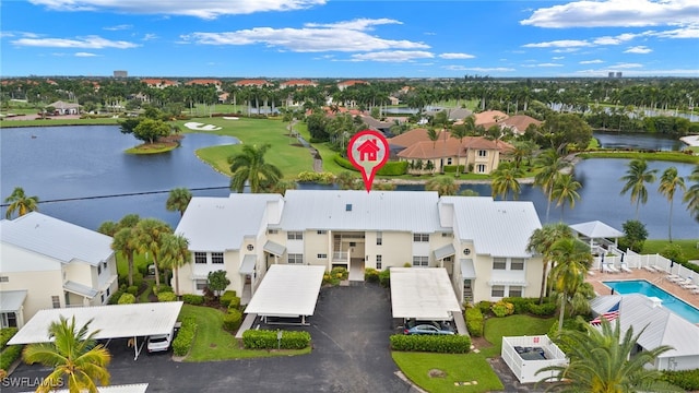 14987 Rivers Edge Ct Unit 139, Fort Myers, FL 33908 - aerial view of residential area featuring a nearby body of water, a local golf course, and a pool area