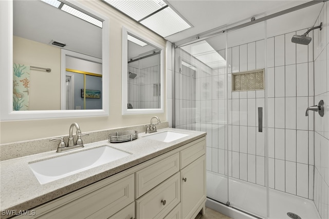 14987 Rivers Edge Ct Unit 139, Fort Myers, FL 33908 - bathroom with a shower stall and double vanity