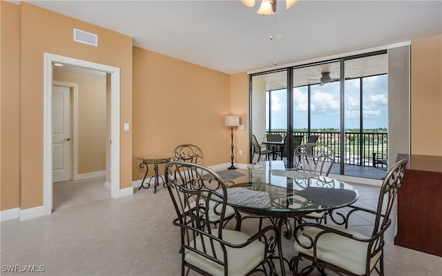 dining area with ceiling fan