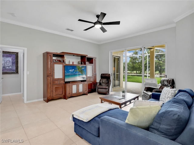 living room with light tile patterned flooring, ceiling fan, and ornamental molding