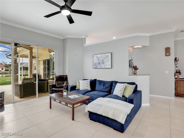 living room featuring light tile patterned flooring, ceiling fan, and crown molding