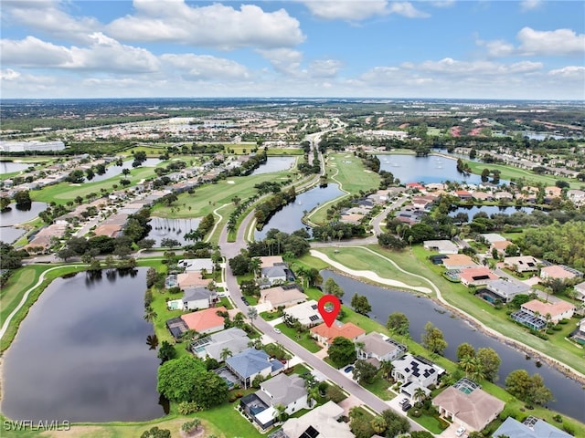 drone / aerial view featuring a water view