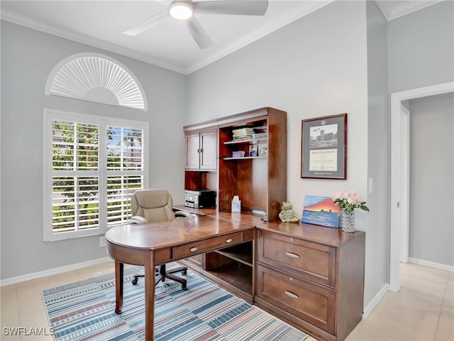 home office featuring light tile patterned flooring, ceiling fan, and ornamental molding