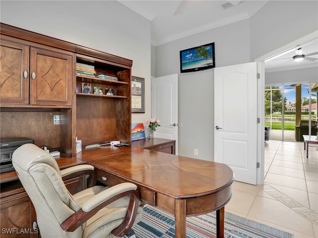 tiled home office featuring ceiling fan and crown molding