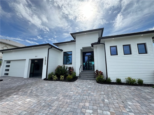 view of front of property featuring a garage