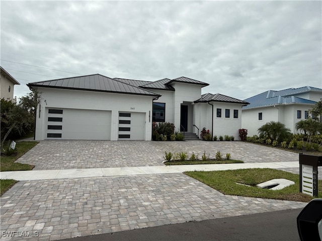 view of front of house with a garage