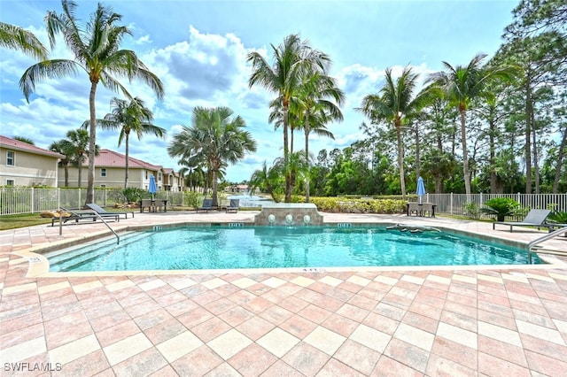 view of swimming pool featuring a patio