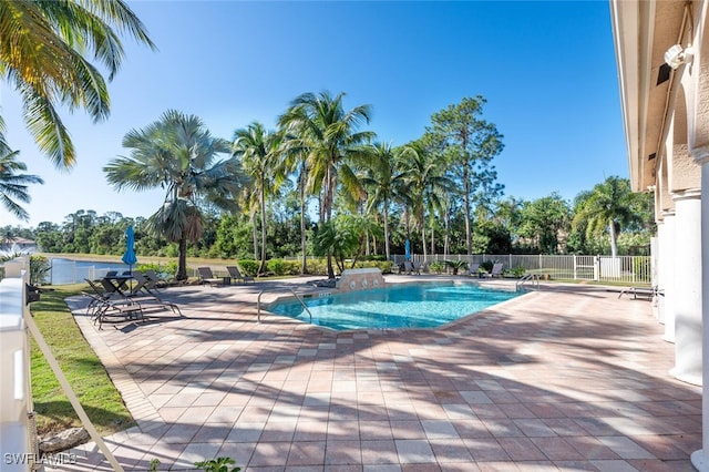 view of swimming pool featuring a patio area