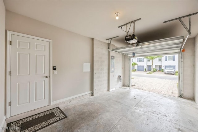 garage featuring a garage door opener