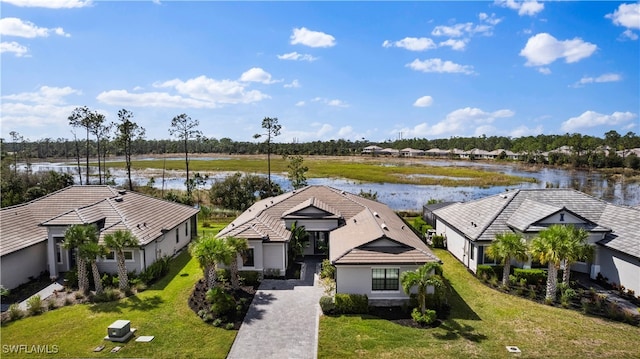 bird's eye view with a water view