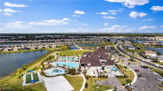 birds eye view of property featuring a water view