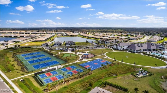 bird's eye view with a water view and a residential view