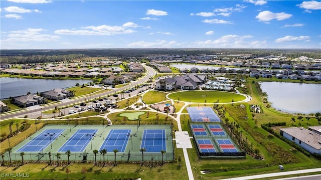 aerial view featuring a water view and a residential view