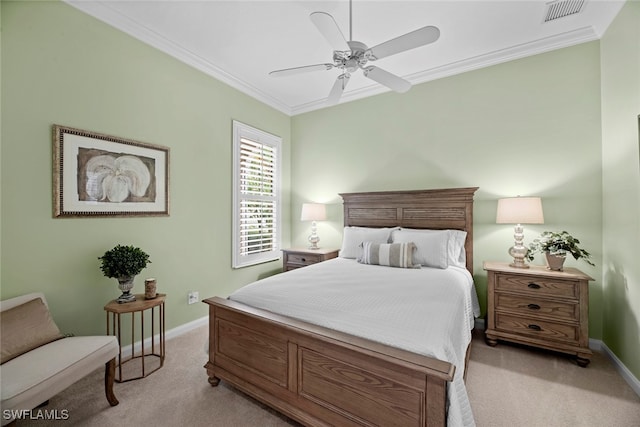 bedroom with light carpet, ceiling fan, and crown molding