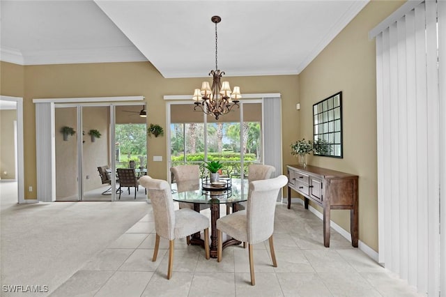 dining space featuring crown molding, light carpet, and a chandelier