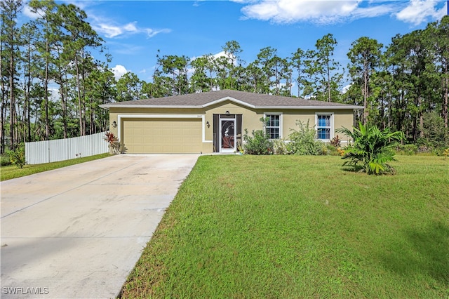 single story home featuring a garage and a front yard