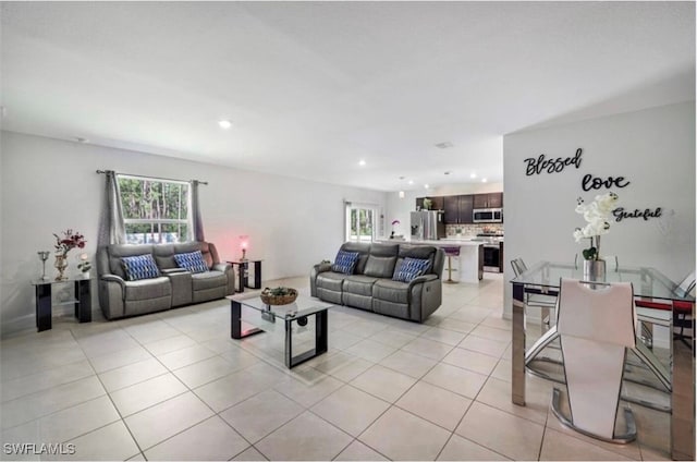 living room with light tile patterned flooring