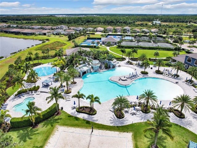 birds eye view of property with a water view