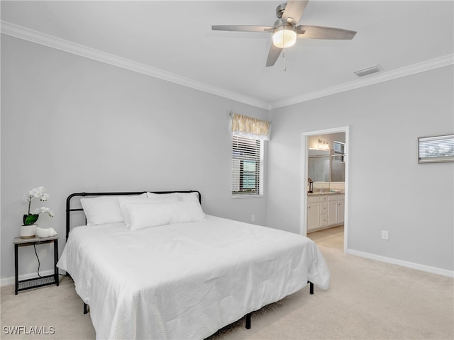 carpeted bedroom with ensuite bathroom, ceiling fan, and ornamental molding