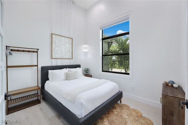 bedroom with light wood-type flooring