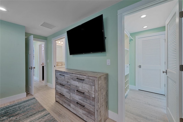 hall featuring light hardwood / wood-style flooring